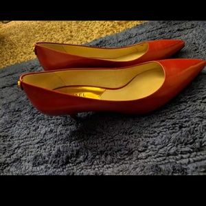 Michael Kors red pumps